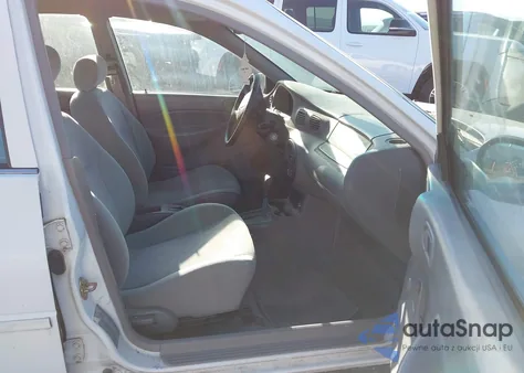 2000 Ford Escort из США, поврежденный, VIN 3FAFP13P3YR233571